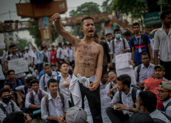 Students gathered at Elephant Road Circle, demanding better road safety and justice for traffic deaths, in Dhaka, Bangladesh,